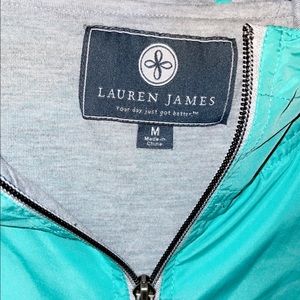 This is a teal blue Lauren James rain coat
